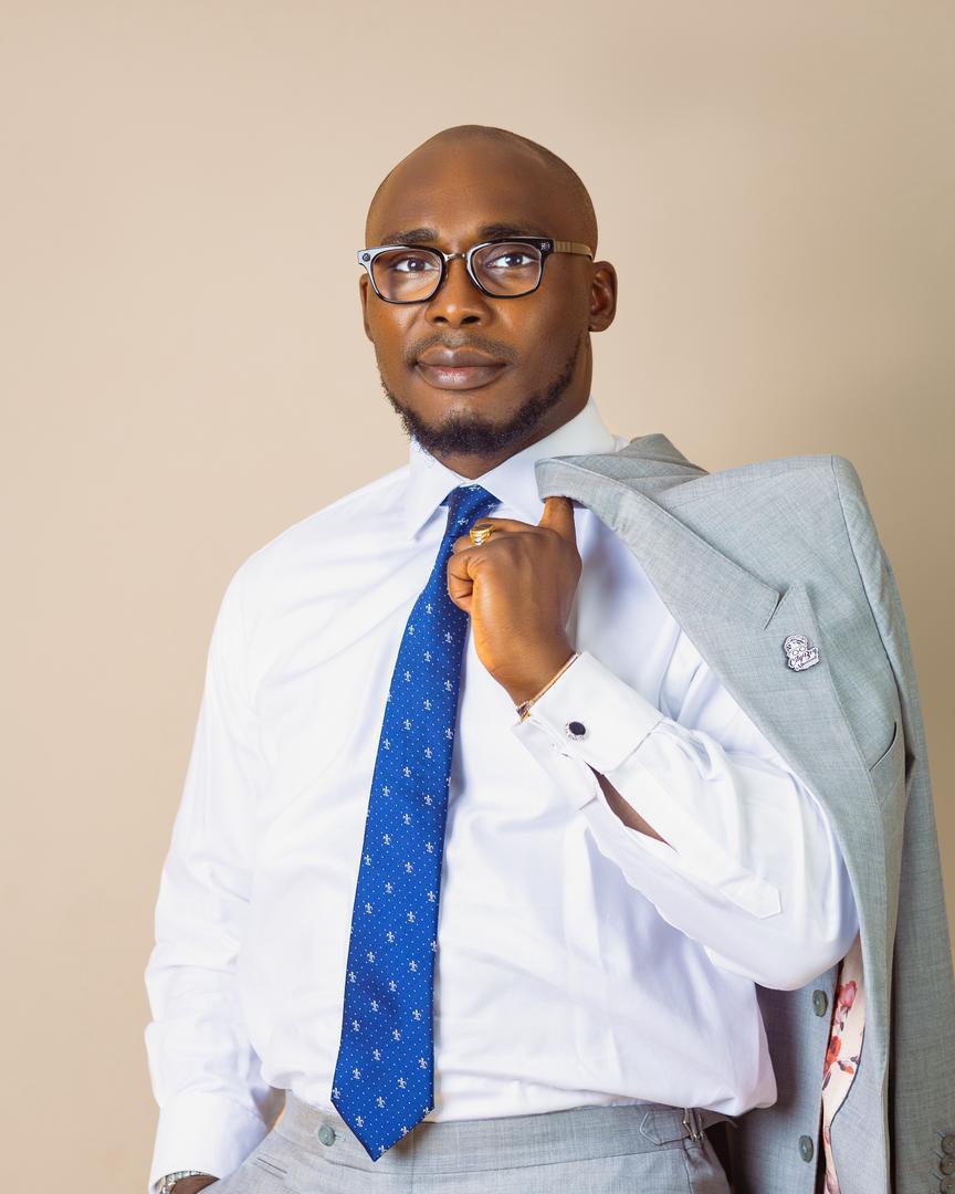 Omoba Kasali Adeboye in a business suit